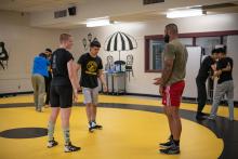 Cst. Sahota teaching wrestling to youth