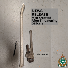 Pipe and Wrench used to threaten police officers